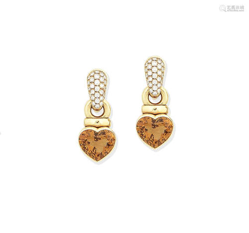 A pair of citrine and diamond earclips