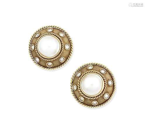 A pair of cultured mabé pearl and diamond earrings