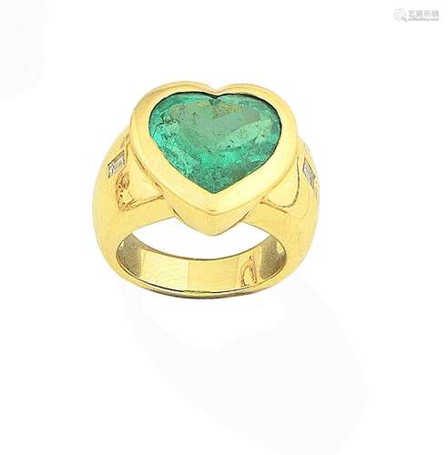 An emerald and diamond ring