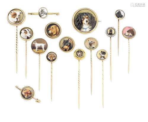 (34) A collection of mid 19th - early 20th century enamel and rock crystal intaglio stick pins and brooches