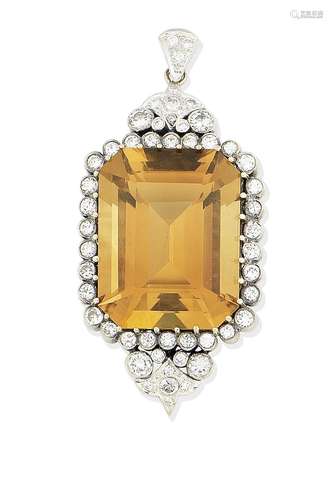 A citrine and diamond pendant