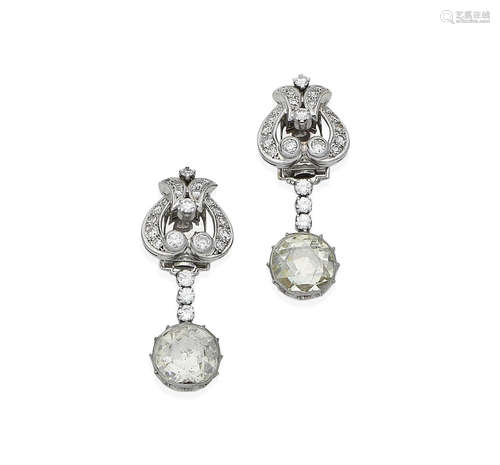 A pair of diamond pendent earrings