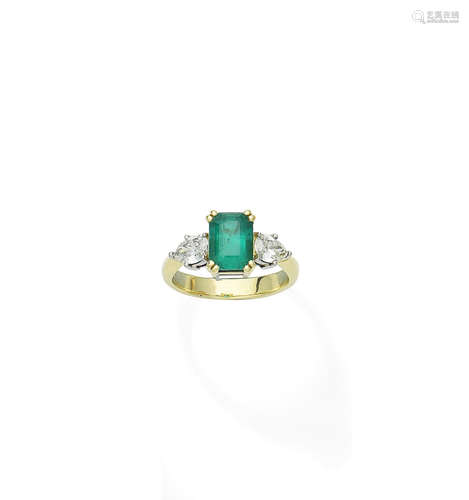 An emerald and diamond ring