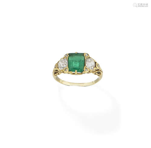 An emerald and diamond ring