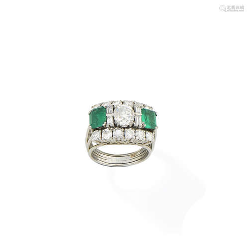 An emerald and diamond ring