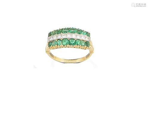 An emerald and diamond ring