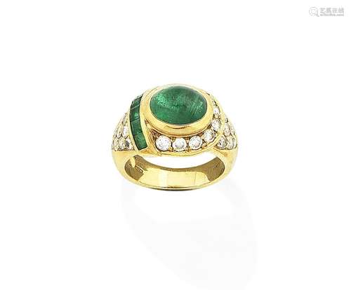 An emerald and diamond ring