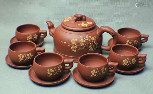 A SET OF TEAPOT AND CUPS MADE BY FENG XINGHUA