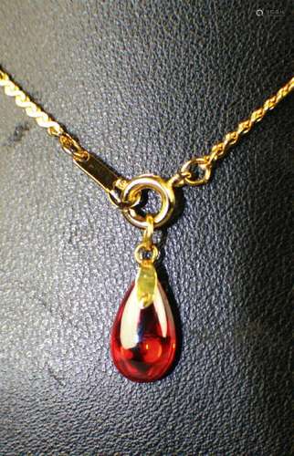 A FLASH RED GEM PENDANT,1/2