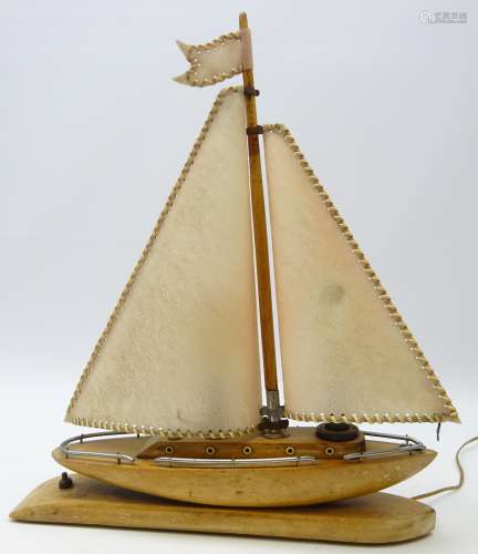 Art Deco table lamp modelled as a yacht with vellum sail & chrome mounts on oak base,