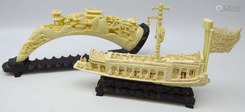 Ivory style resin model of a Chinese Junk & tusk, both on hardwood stands,