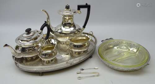 Silver plated four piece tea set of half reeded form, pair silver tongs, , small serving trident,