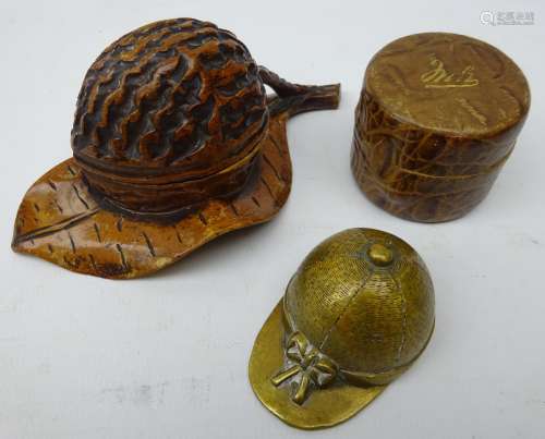 Black Forest carved inkwell in the form of a walnut on leaf,