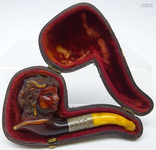 Meershaum and amber pipe carved as a lady with white metal collar in original case