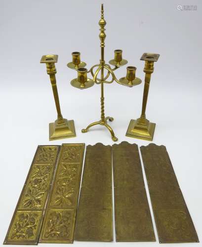Arts & Crafts adjustable brass four branch table candelabra with knop finial,