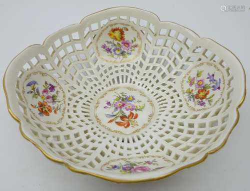 19th century KPM Berlin porcelain basket with five panels hand painted with floral sprays, D19.