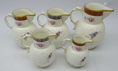 Set three graduating Coalport 'The Caughley Mask Head Jug' with burgundy bands and a matched set of
