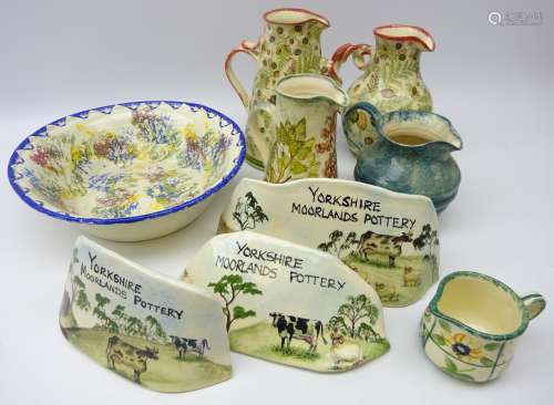 Yorkshire Moorlands Pottery including three pitchers and three stands,