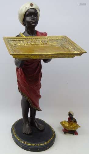 Large composite Blackamoor figure holding a tray, H90cm and a matching miniature figure,