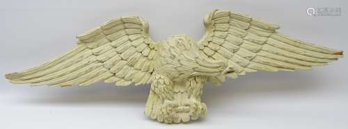 Large carved wall mounted model of an Eagle with wings outstretched,