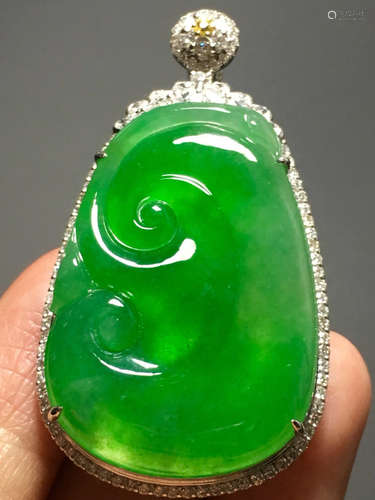 AN ICY ZHENGYANG GREEN RUYI JADEITE PENDANT