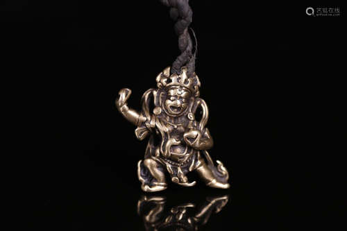 A GILT BRONZE PENDANT OF BUDDHA