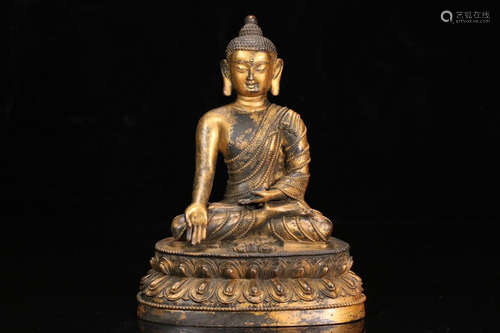 A GILT BRONZE BUDDHA