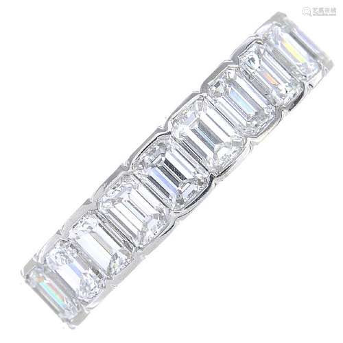 A platinum diamond eternity ring. Designed as a