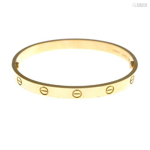 CARTIER - an 18ct gold 'Love' bangle. The polished