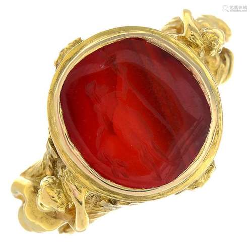 An Art Nouveau 18ct gold carnelian signet ring. The