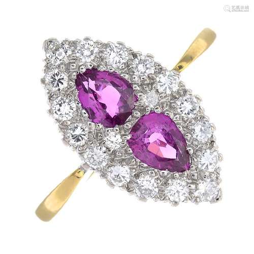 An 18ct gold ruby and diamond dress ring. Of