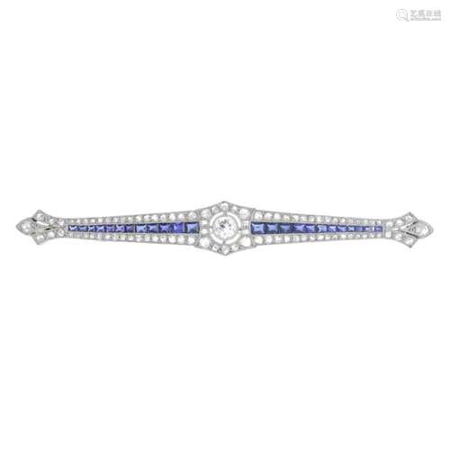 A mid 20th century platinum and 18ct gold, sapphire and