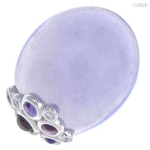 An 18ct gold chalcedony and diamond ring. The oval blue