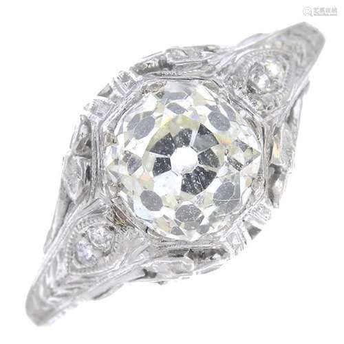 A diamond single-stone ring. The old-cut diamond, with