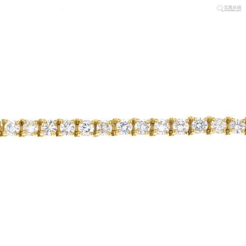 A diamond line bracelet. Comprising fifty-one vari-cut