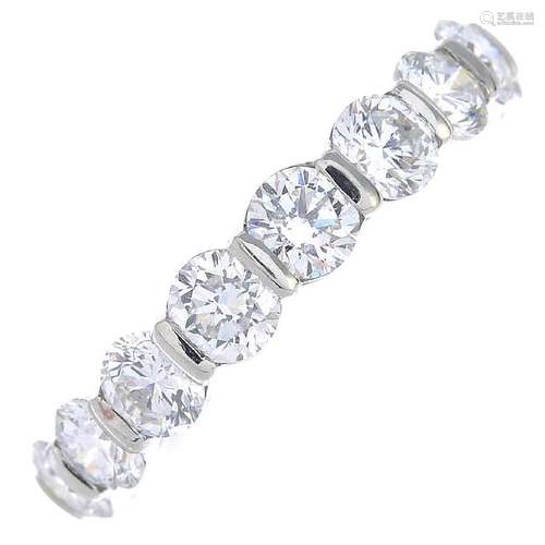 A platinum diamond eternity ring. Designed as a