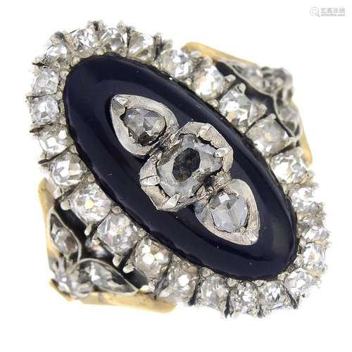 An 18ct gold diamond and enamel ring. The old and