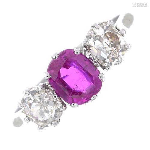 A Burmese ruby and diamond three-stone ring. The