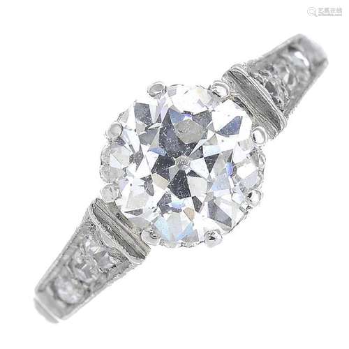 A diamond single-stone ring. The old-cut diamond, with