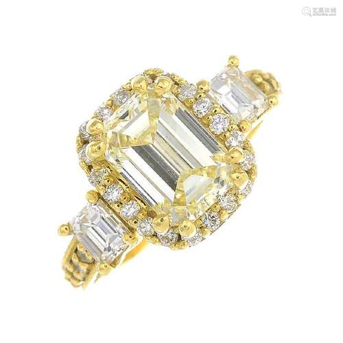 A coloured diamond and diamond ring. The