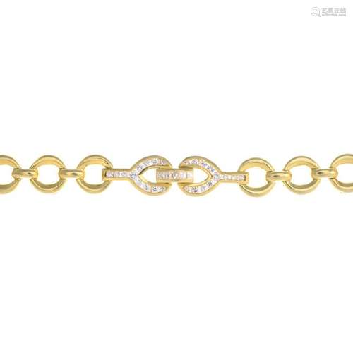 An 18ct gold diamond bracelet. Designed as two