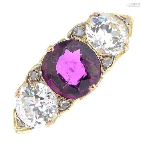 A late Victorian 18ct gold ruby and diamond three-stone