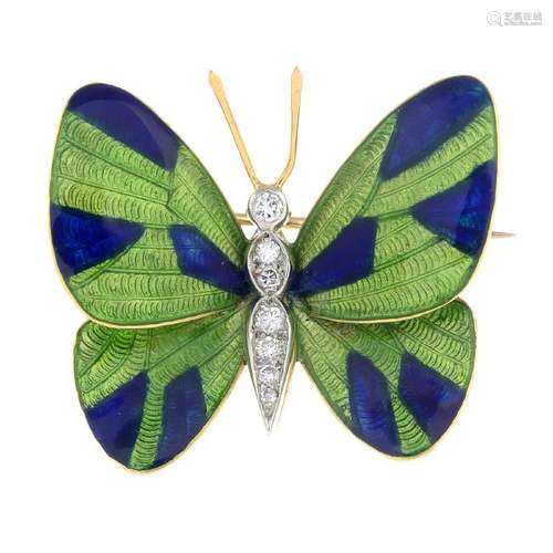 A diamond and enamel butterfly brooch. The