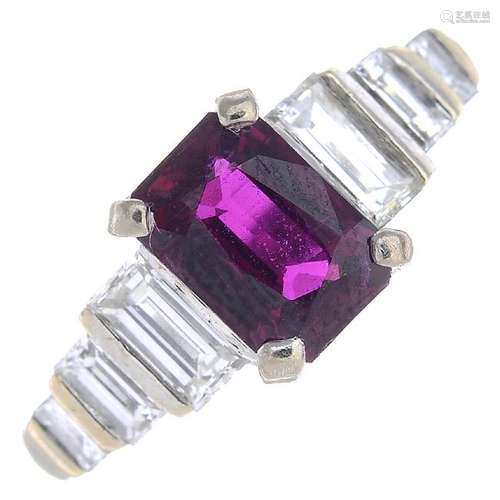 A ruby and diamond ring. The rectangular-shape ruby,