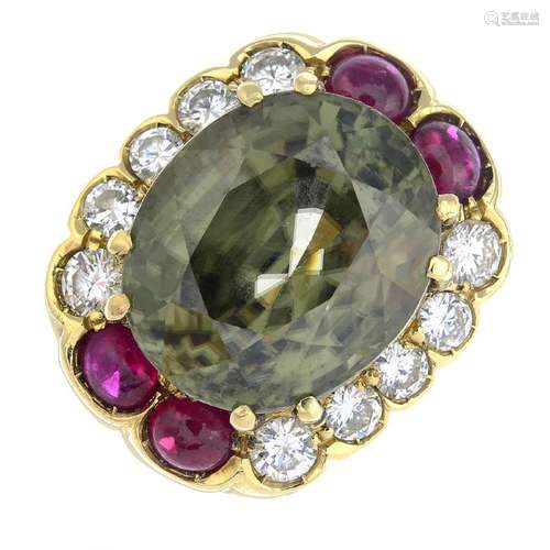 An 18ct gold zircon, ruby and diamond ring. The