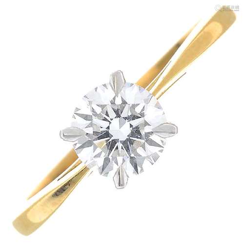 An 18ct gold diamond single-stone ring. The