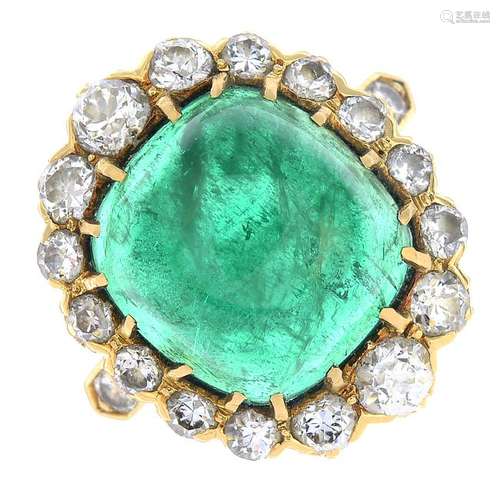 An 18ct gold Colombian emerald and diamond cluster