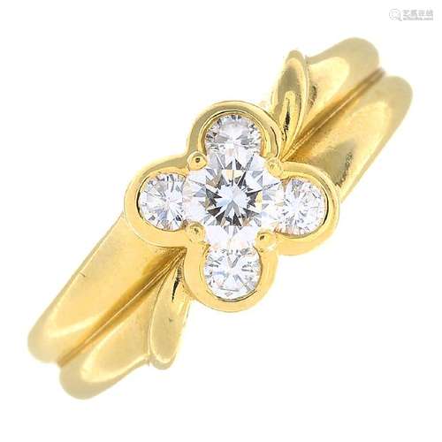 VAN CLEEF & ARPELS - an 18ct gold diamond floral ring.