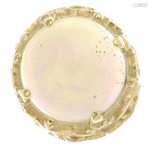 An opal dress ring. The circular opal cabochon, with