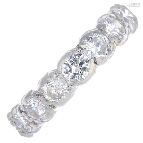 A diamond full eternity ring. Designed as a